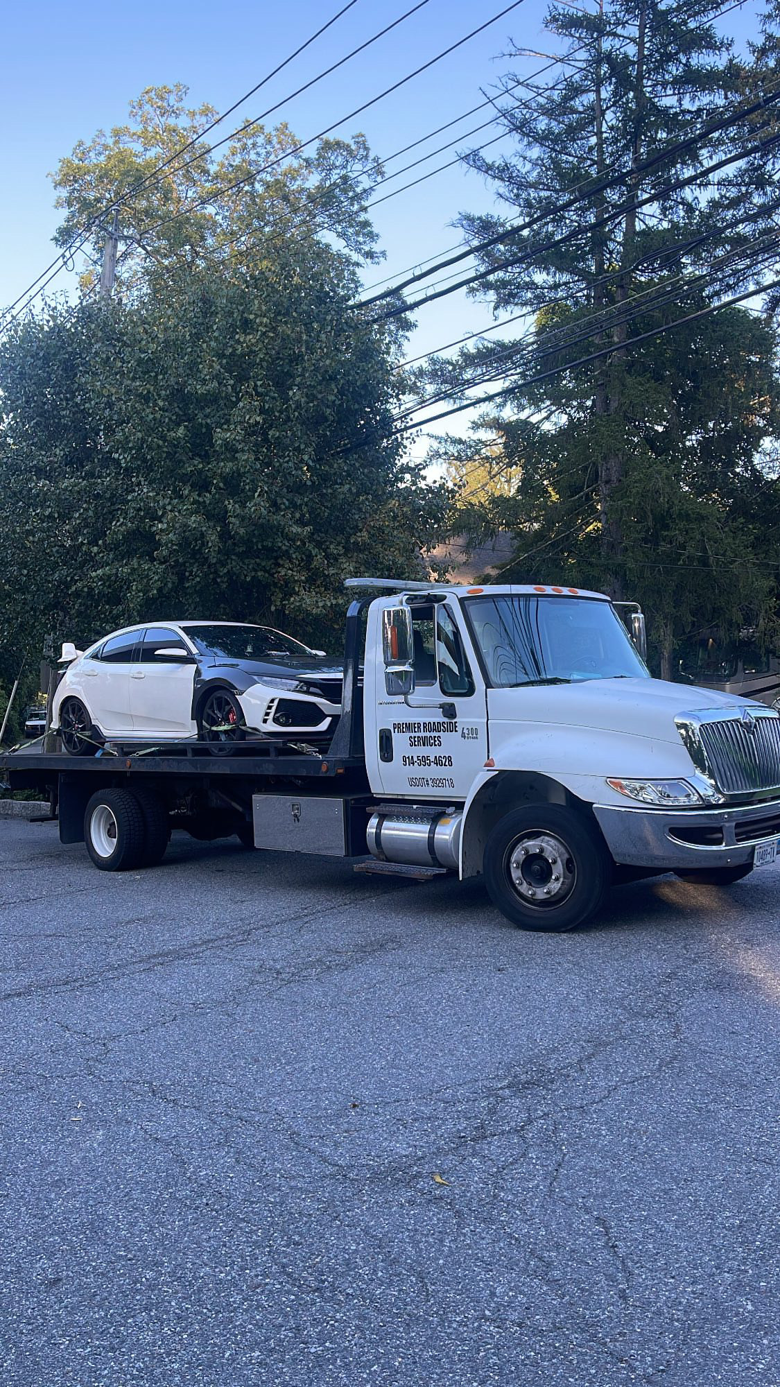 Towing truck towing a car